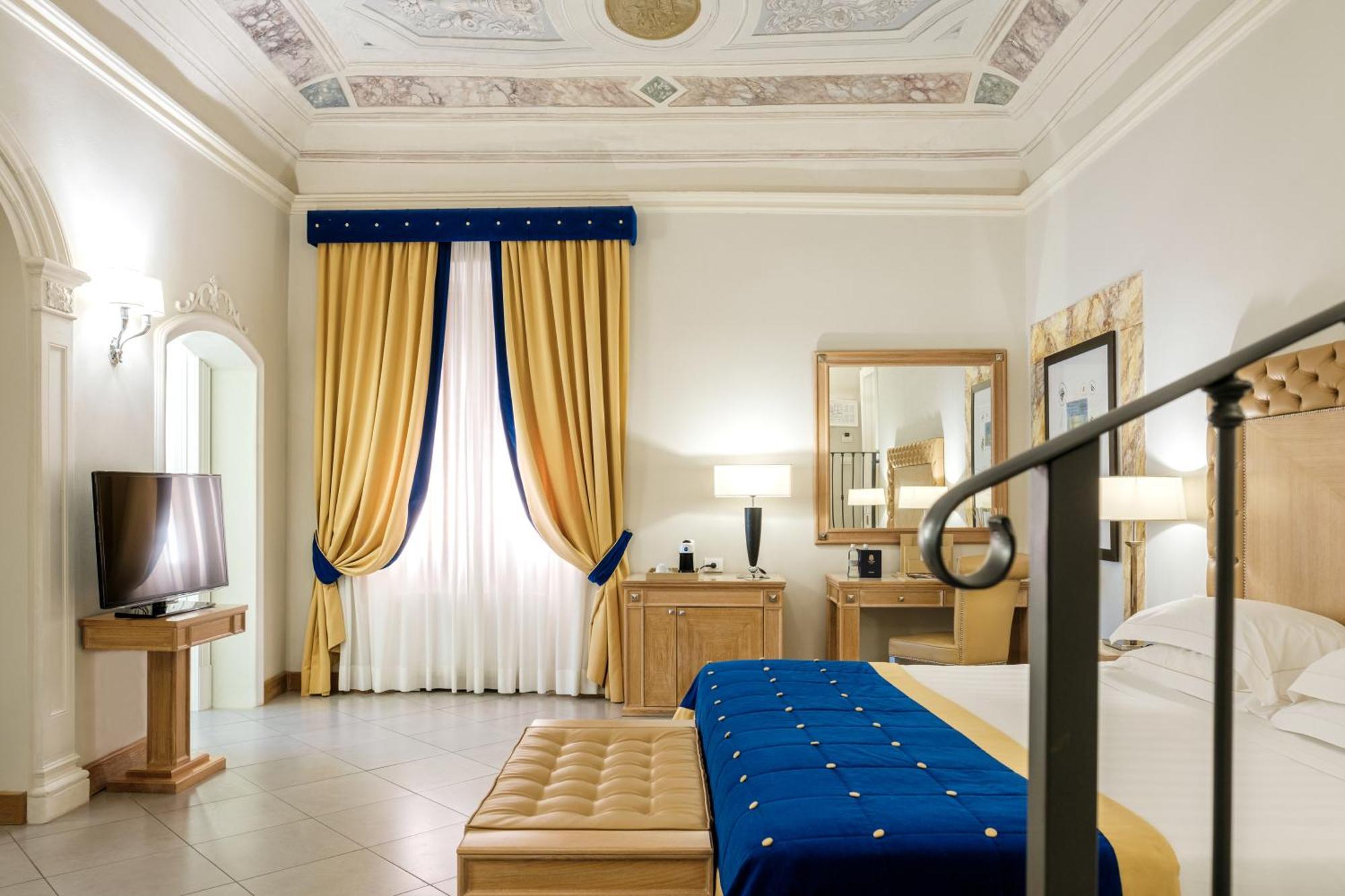 Villa Tolomei Hotel & Resort Florens Exteriör bild A room at the hotel
