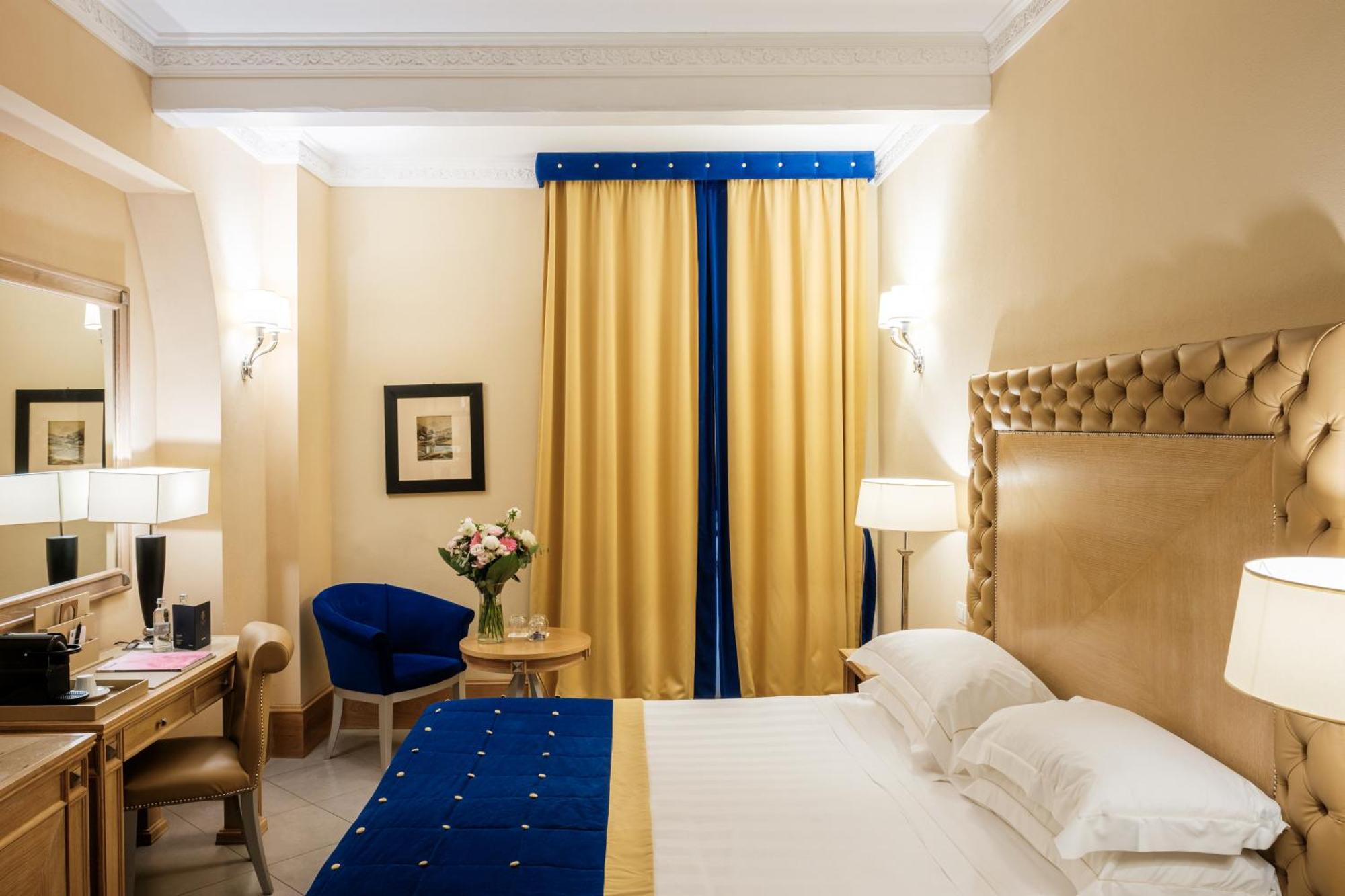 Villa Tolomei Hotel & Resort Florens Exteriör bild A room at the hotel