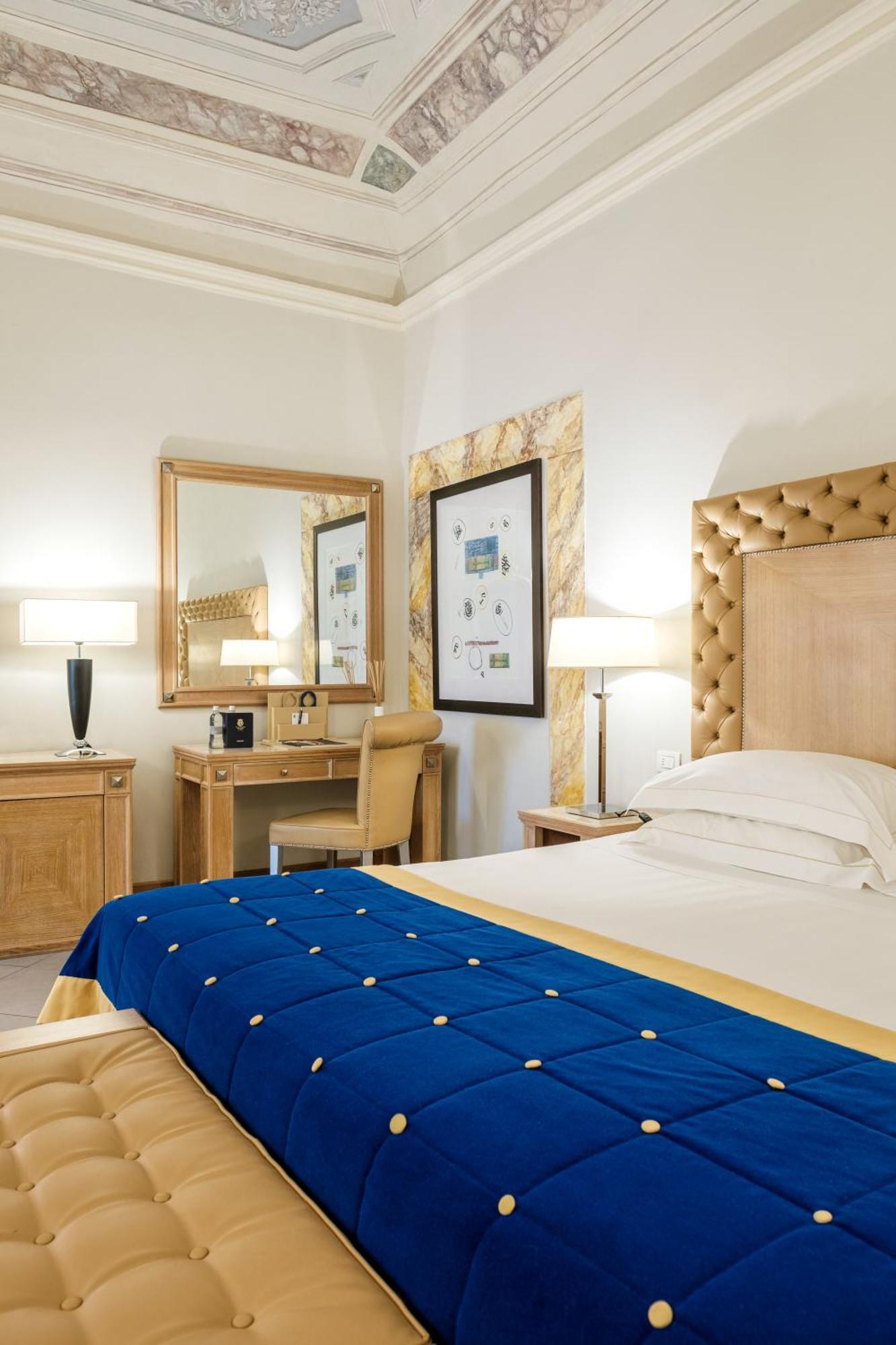 Villa Tolomei Hotel & Resort Florens Exteriör bild A room at the hotel