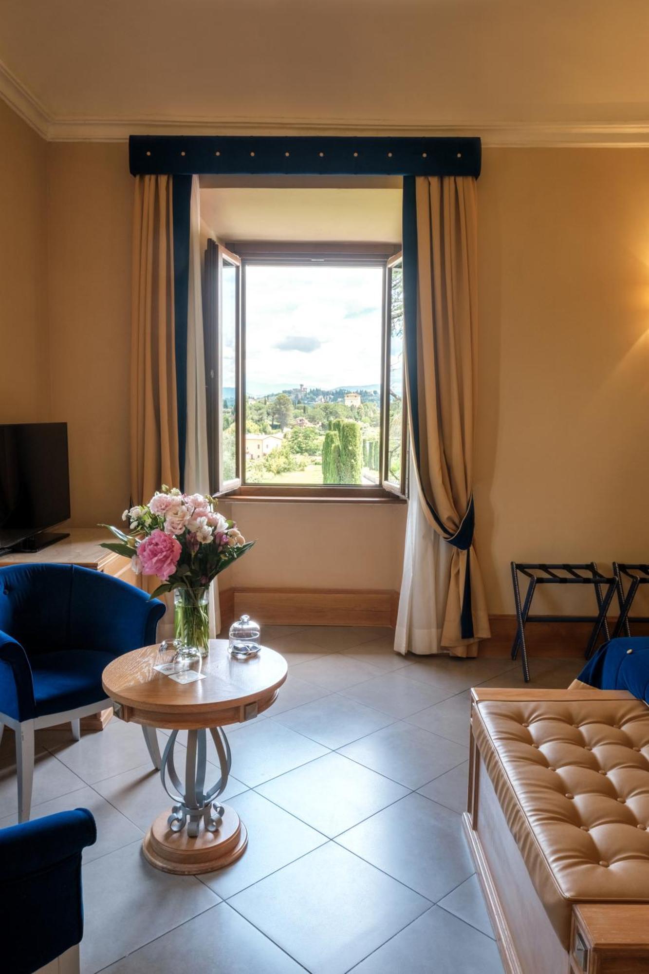 Villa Tolomei Hotel & Resort Florens Exteriör bild A room at the hotel