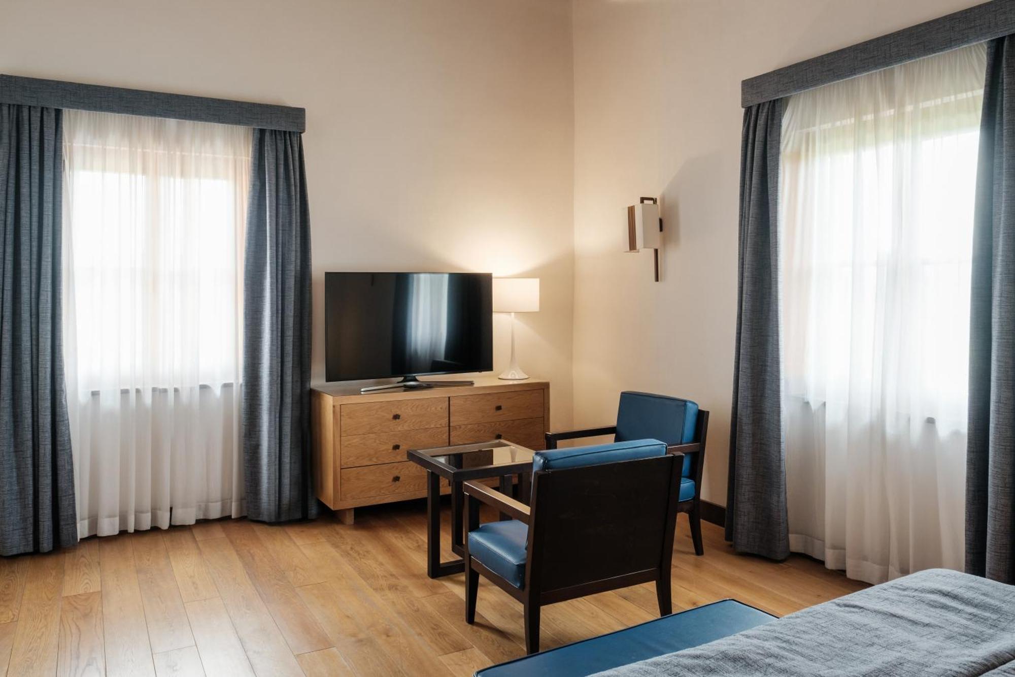 Villa Tolomei Hotel & Resort Florens Exteriör bild A room at the hotel