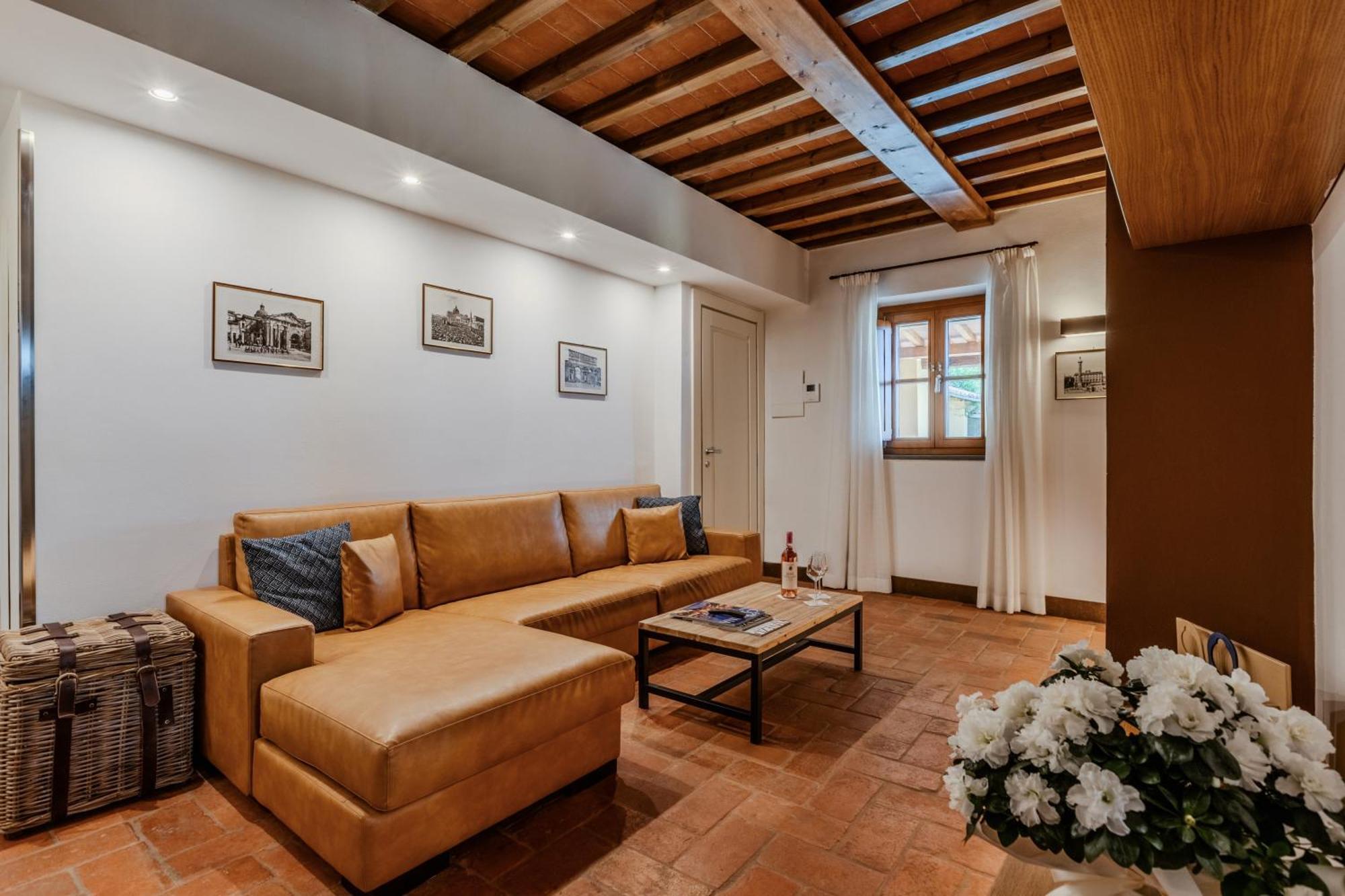 Villa Tolomei Hotel & Resort Florens Exteriör bild A living room in a house