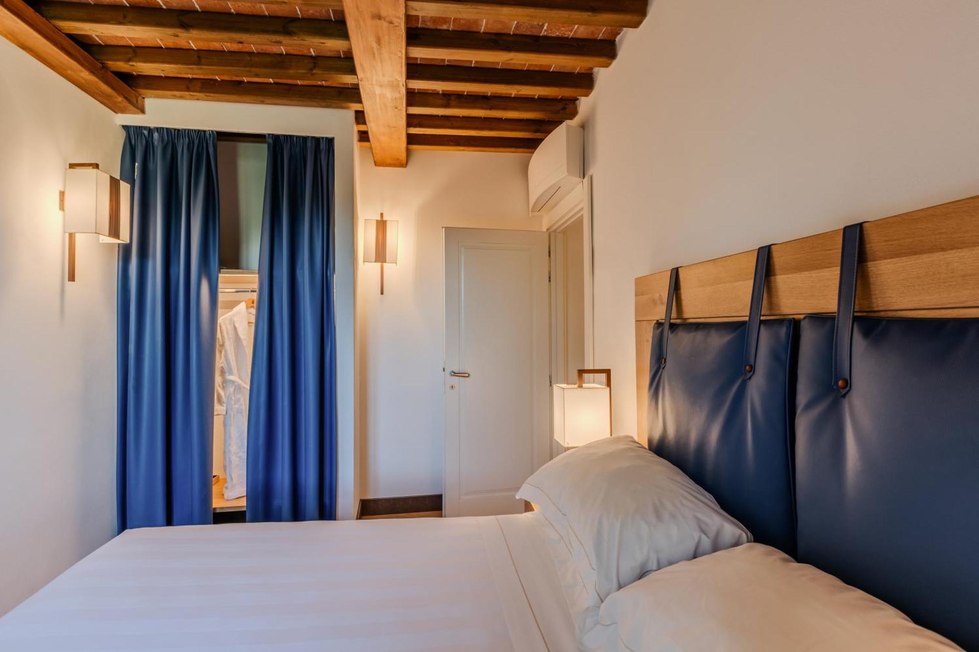 Villa Tolomei Hotel & Resort Florens Exteriör bild A room at the hotel