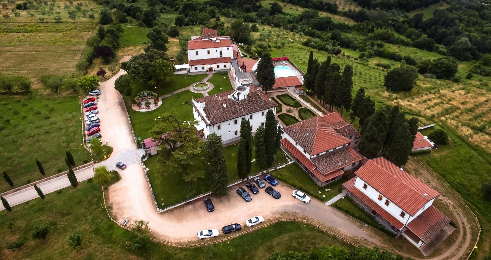 Villa Tolomei Hotel & Resort Florens Exteriör bild Aerial view of the monastery